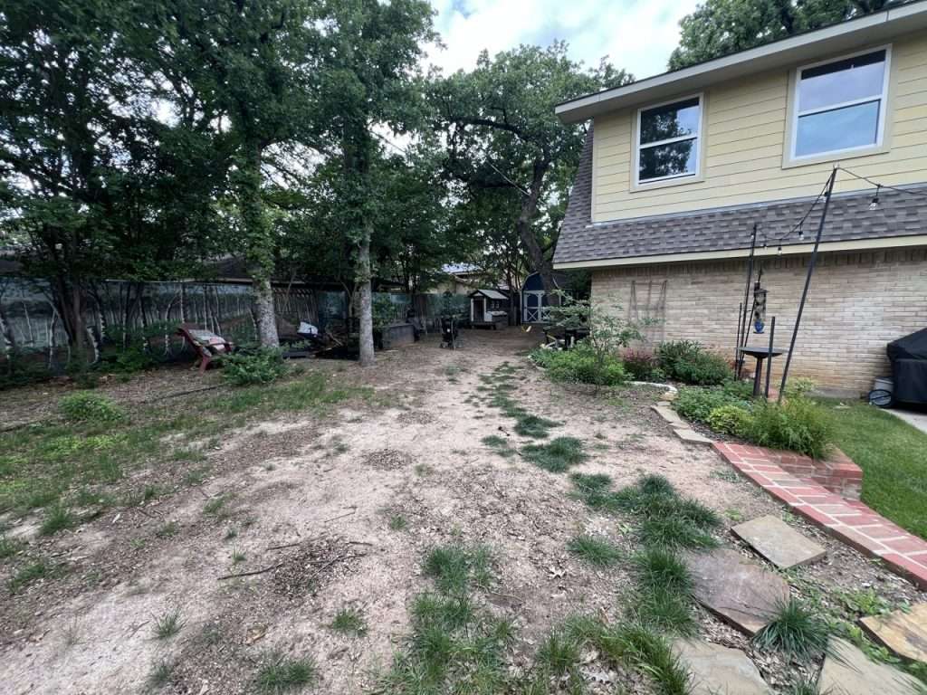 Bare Dallas side yard before flagstone walkway and lawn installation